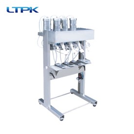 Perfume filing machine /four