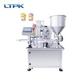 Rotary cup filling and sealing machine