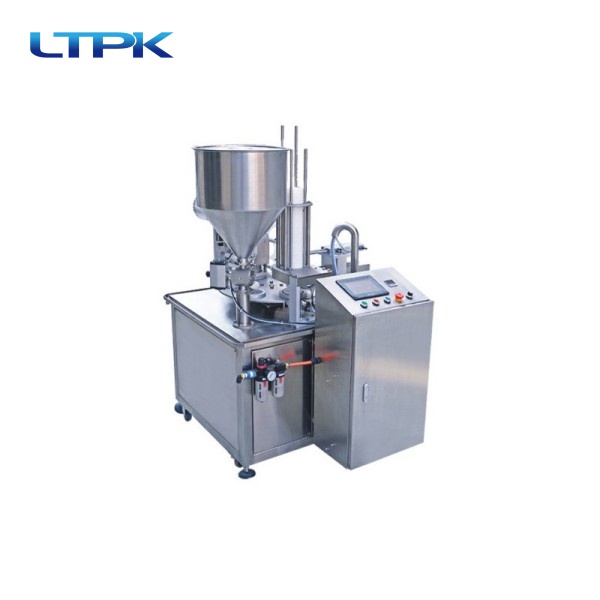 Automatic rotary filling and sealing machine