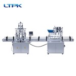 Four-head liquid filling machine +turntable drop cap screwing machine